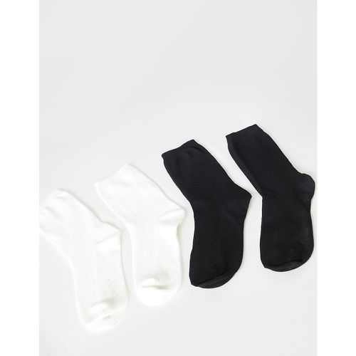 Lot de 2 paires de chaussettes style sport Noir & blanc - PrettyLittleThing - Modalova
