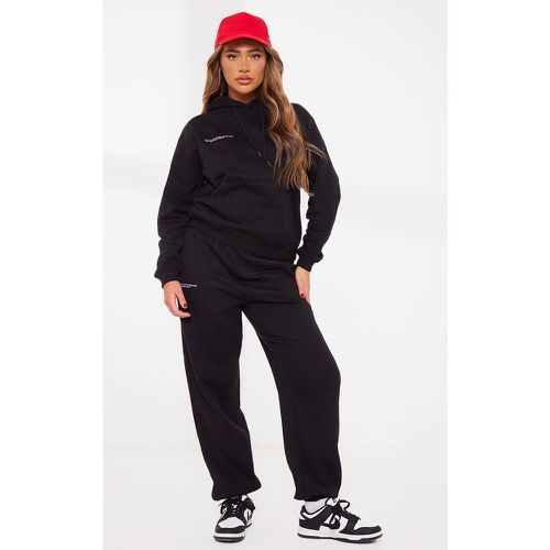 Jogging à bas resserré et slogan Est 2012 - PrettyLittleThing - Modalova