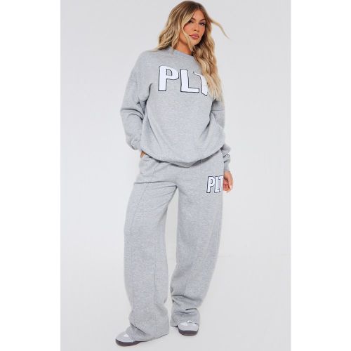 Jogging large à appliqué moumouté - PrettyLittleThing - Modalova