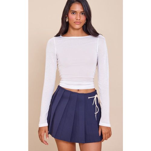 Mini jupe-short plissée à noeud - PrettyLittleThing - Modalova