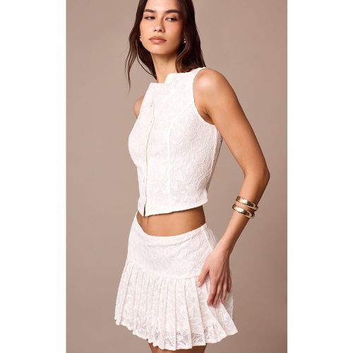 Mini-jupe en dentelle blanche plissée | Taille 44 - PrettyLittleThing - Modalova
