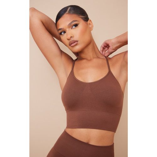 Brassière de sport rembourrée basique sans coutures - PrettyLittleThing - Modalova