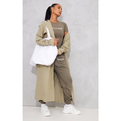 Jogging kaki sauge à taille haute et ourlets resserrés | Taille Large - PrettyLittleThing - Modalova