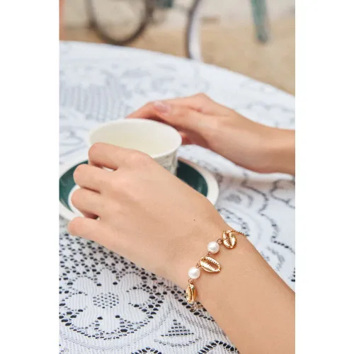 Bracelet doré avec coquillages - CUPSHE - Modalova