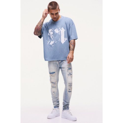 Jean skinny déchiré et réparé - 28R - Boohooman - Modalova