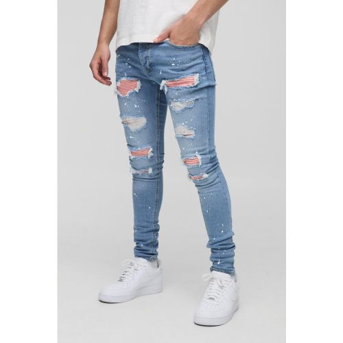 Jean super skinny déchiré et réparé à taches de peinture - 28R - Boohooman - Modalova