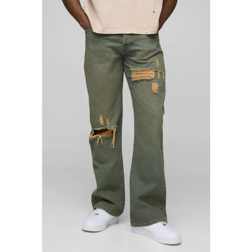 Jean flare large délavé à déchirures - 28R - Boohooman - Modalova