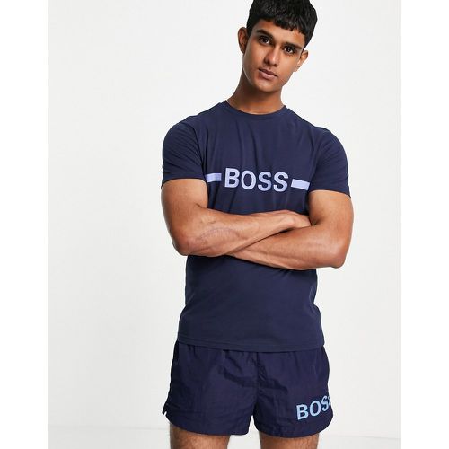 BOSS - Beachwear - T-shirt ajusté à protection solaire avec grand logo sur le devant - Bleu - BOSS Bodywear - Modalova