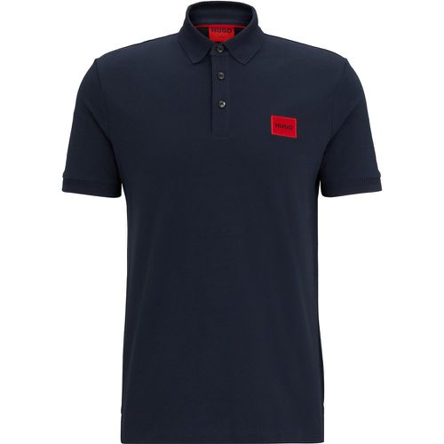 Polo Slim Fit en piqué de coton avec étiquette logo - HUGO - Modalova