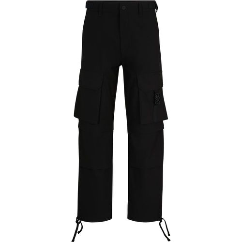 Pantalon cargo Regular Fit avec sangles à logo revisité - HUGO - Modalova