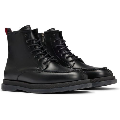 Bottines mi-hautes en cuir avec lacets et tirant aux couleurs de la marque - HUGO - Modalova