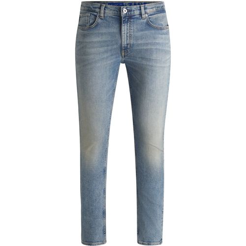 Jean Extra Slim en denim stretch bleu stone-washed - HUGO - Modalova