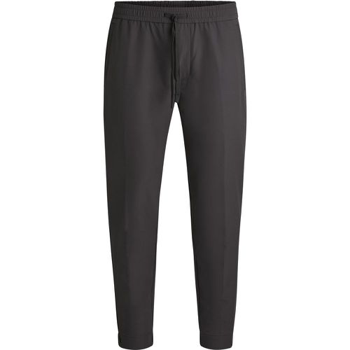 Pantalon Tapered en tissu stretch déperlant - Boss - Modalova