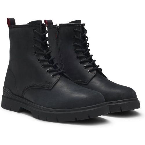 Bottines en cuir avec logo embossé - HUGO - Modalova