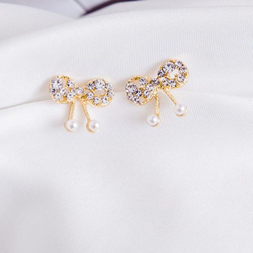 Clous d'oreilles avec fausses perles - SHEIN - Modalova