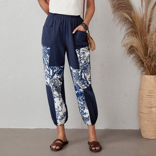 Pantalon carotte avec imprimé plante - SHEIN - Modalova