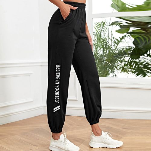 Pantalon de sport graphique de slogan taille élastique - SHEIN - Modalova