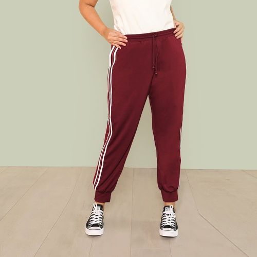 Grande taille Sweat-pantalon à rayures avec ceinture - SHEIN - Modalova