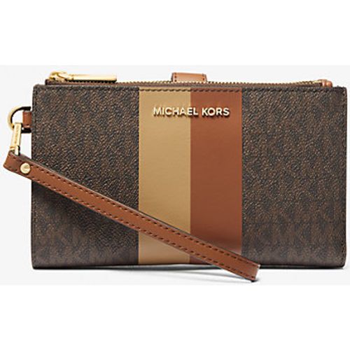 MK Grand portefeuille Jet Set pour smartphone à rayure et à logo Signature - Michael Kors - MICHAEL Michael Kors - Modalova