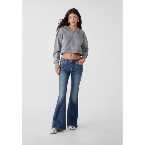 D04 Jean flare taille basse 32 - Stradivarius - Modalova