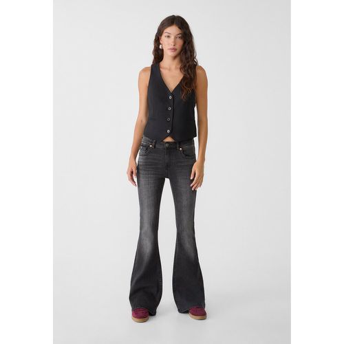 D04 Jean flare taille basse 32 - Stradivarius - Modalova