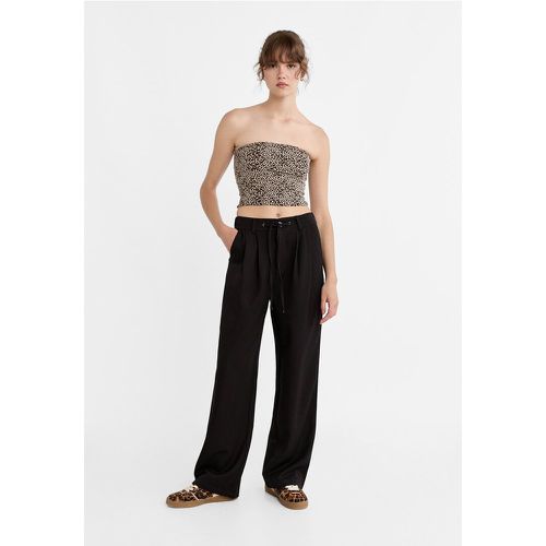 Pantalon regular jambe large avec cordons à la taille 32 - Stradivarius - Modalova