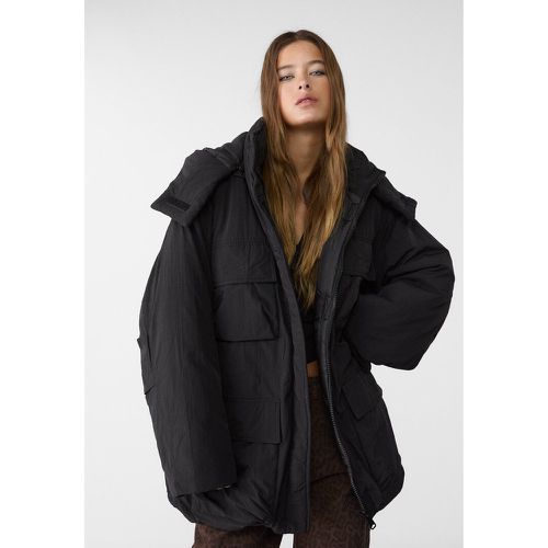 Parka matelassée oversize avec poches XS - Stradivarius - Modalova