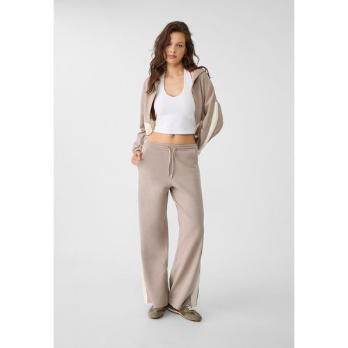 Pantalon palazzo rayé sur le côté L - Stradivarius - Modalova