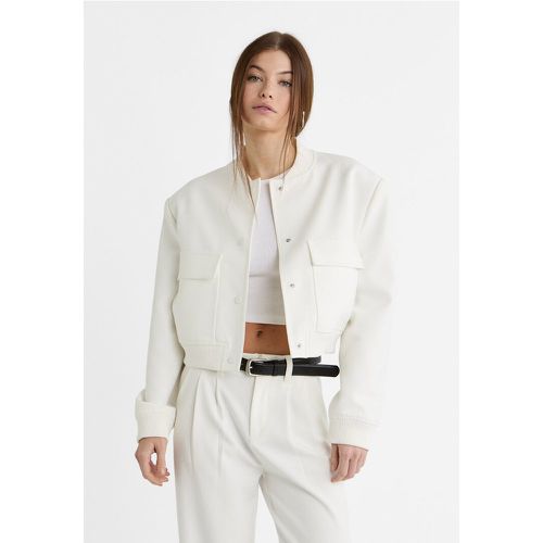 Blouson bomber maxi poches Écru XS - Stradivarius - Modalova