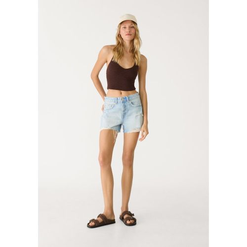 D75 Short en jean déchiré / 32 - Stradivarius - Modalova