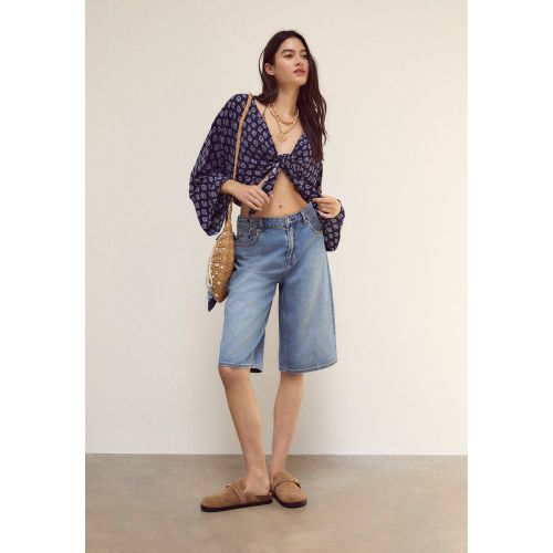 Blouse fluide à nœud XS - Stradivarius - Modalova