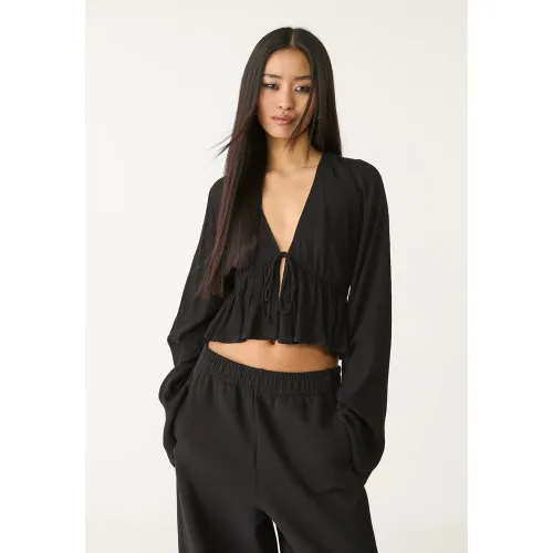 Chemise à lacets et volants XS - Stradivarius - Modalova