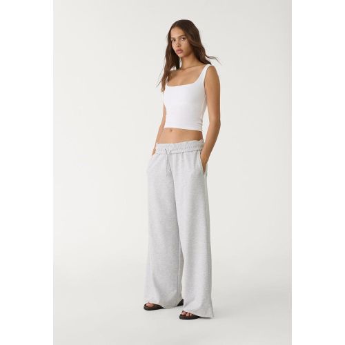 Pantalon molleton jambes larges liseré XS - Stradivarius - Modalova