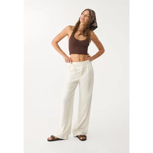 Pantalon fluide à nœud avec lin Écru 32 - Stradivarius - Modalova