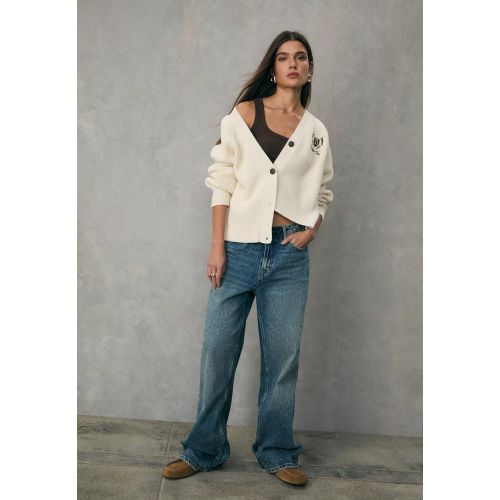 Gilet boutonné en maille brodée XS - Stradivarius - Modalova