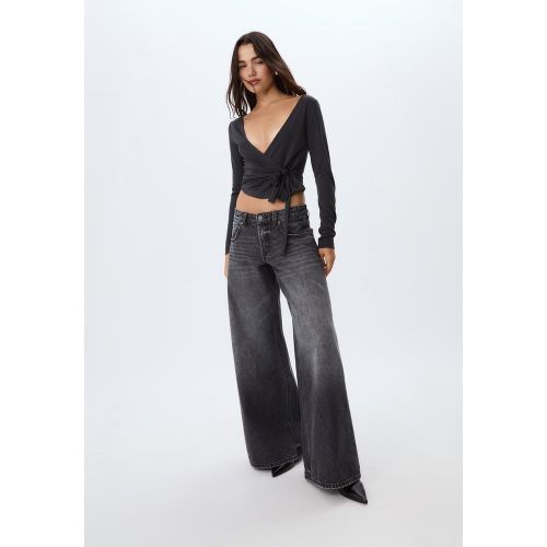 Jean taille basse wide leg étoiles DENIM NOIR EFFET DÉLAVÉ 32 - Stradivarius - Modalova