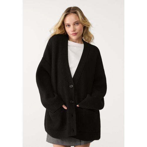 Veste longue en maille avec poches XS-S - Stradivarius - Modalova