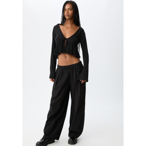 Chemise à nœud et volants XS - Stradivarius - Modalova