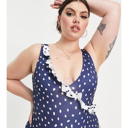 ASOS DESIGN Curve - Maillot de bain décolleté à pois en tissu recyclé avec volants - Bleu marine - ASOS Curve - Modalova
