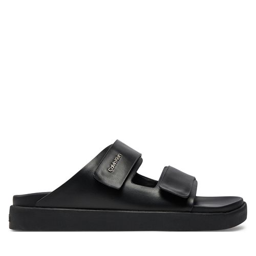Mules / sandales de bain Calvin Klein Flat Adj Slide Calvin Mtl Lth HW0HW01954 Noir - Chaussures.fr - Modalova