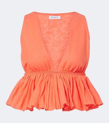 Alaïa Top péplum en coton et lin - Alaia - Modalova