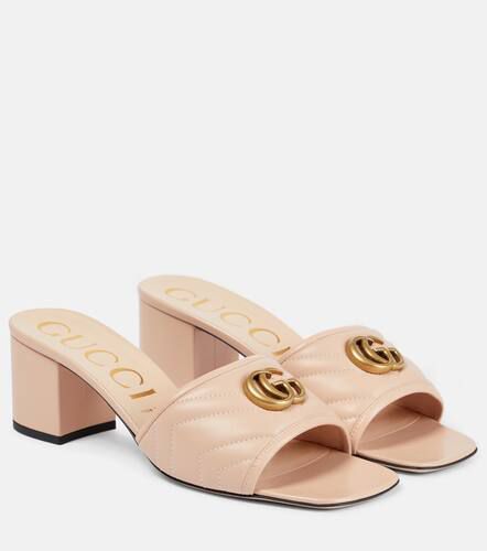 Gucci Mules GG matelassé en cuir - Gucci - Modalova