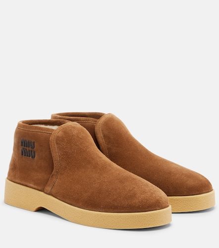 Miu Miu Bottes en daim et shearling - Miu Miu - Modalova
