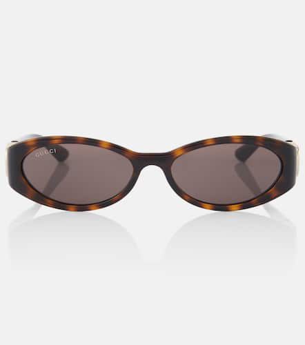 Lunettes de soleil ovales Interlocking G - Gucci - Modalova