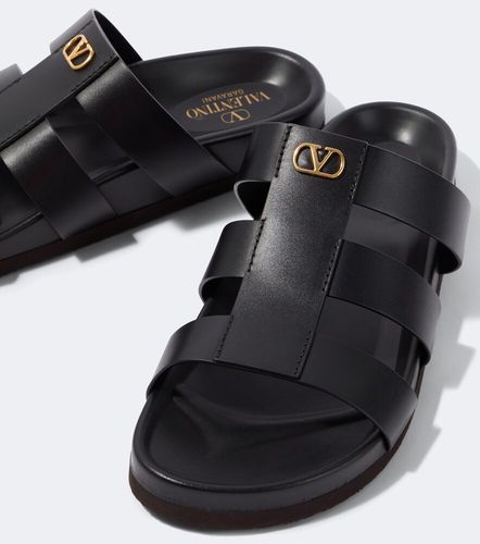 Sandales StudShield VLogo en cuir - Valentino Garavani - Modalova