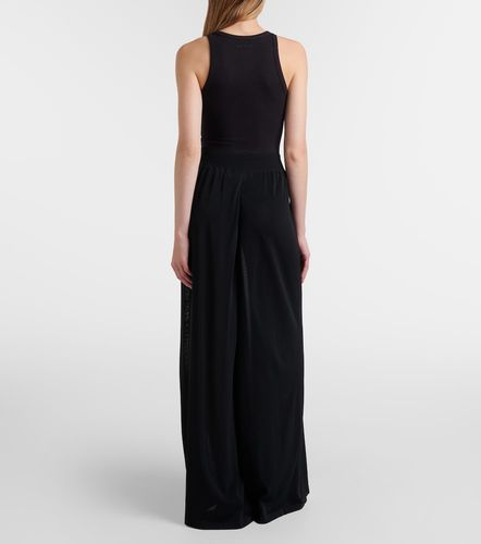Alaïa Pantalon ample à taille haute - Alaia - Modalova