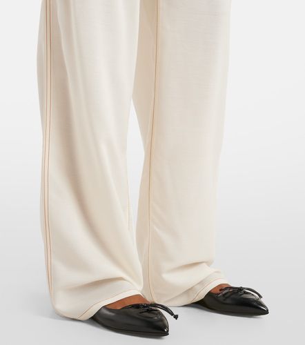 Alaïa Pantalon ample à taille haute en laine mélangée - Alaia - Modalova