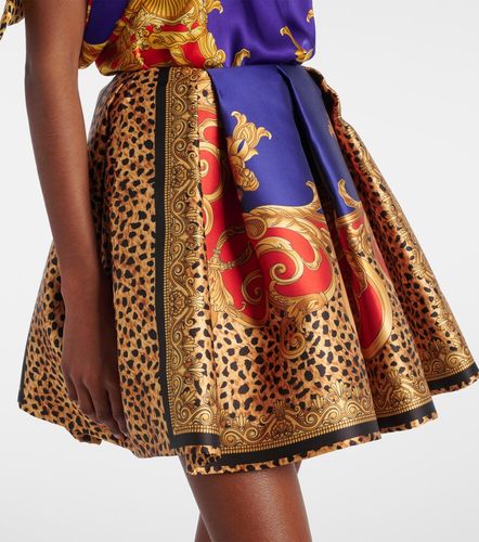 Mini-jupe imprimée en satin - Versace - Modalova