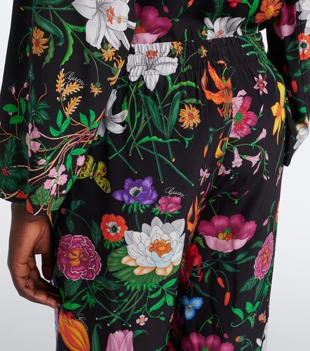 Pantalon palazzo Flora en soie à fleurs - Gucci - Modalova