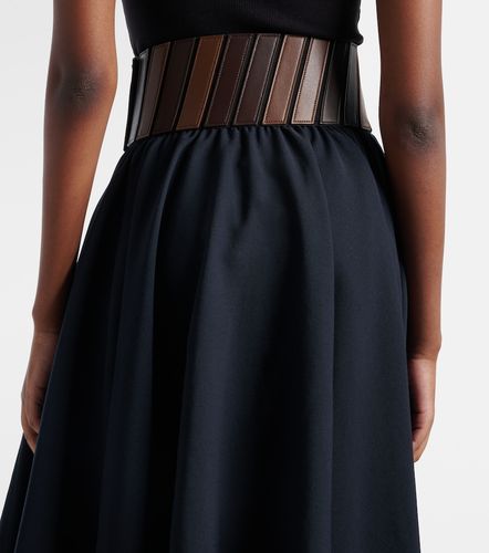 Alaïa Jupe midi en laine et cuir - Alaia - Modalova